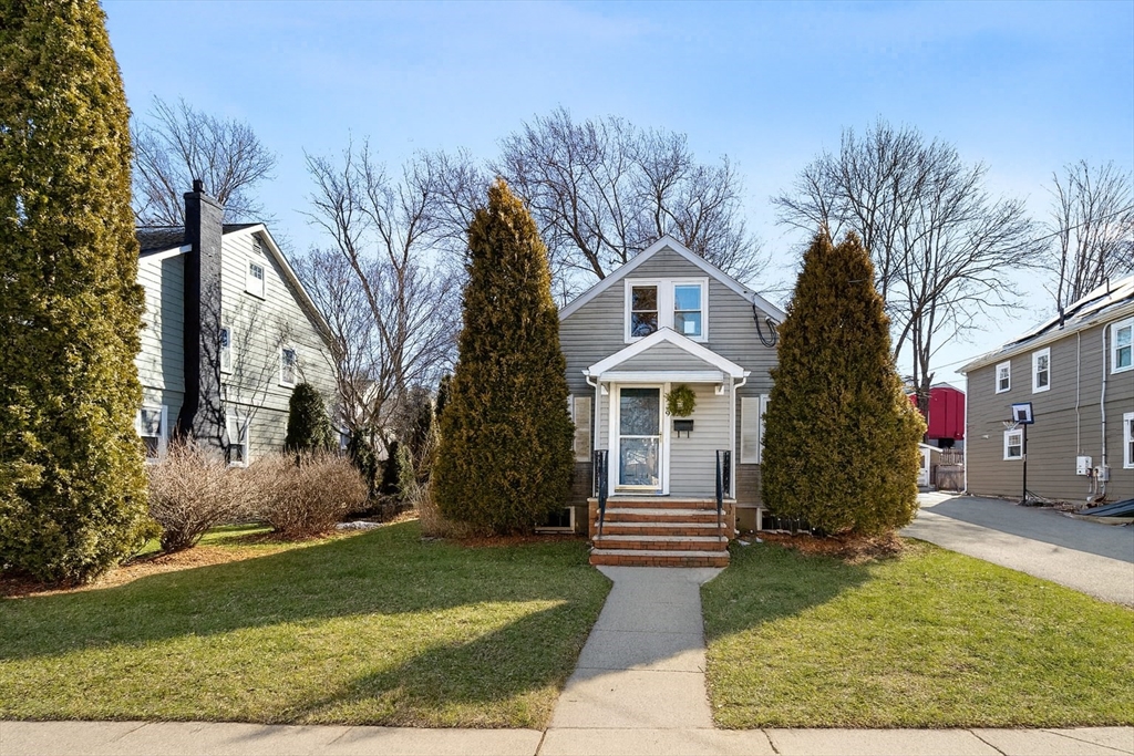 9 Wildwood Road Medford, MA 02155 - Photo 2 of 38 front view of house with a yard