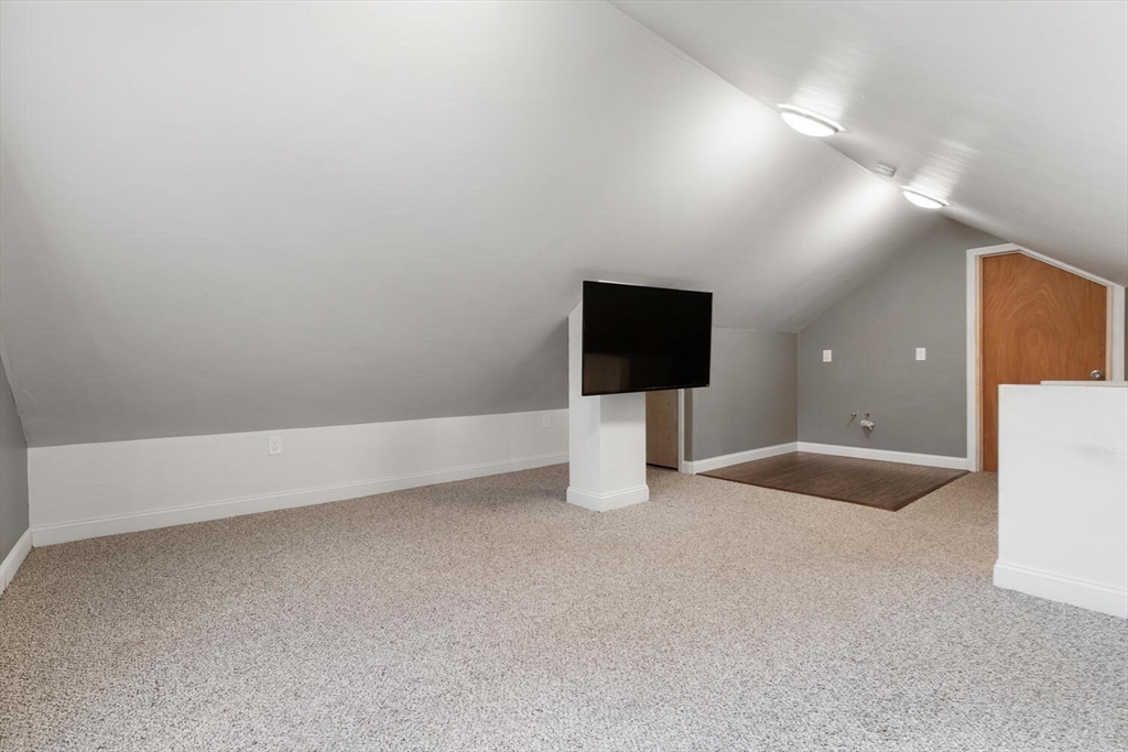 9 Wildwood Road Medford, MA 02155 - Photo 27 of 38 a view of empty room with wooden floor