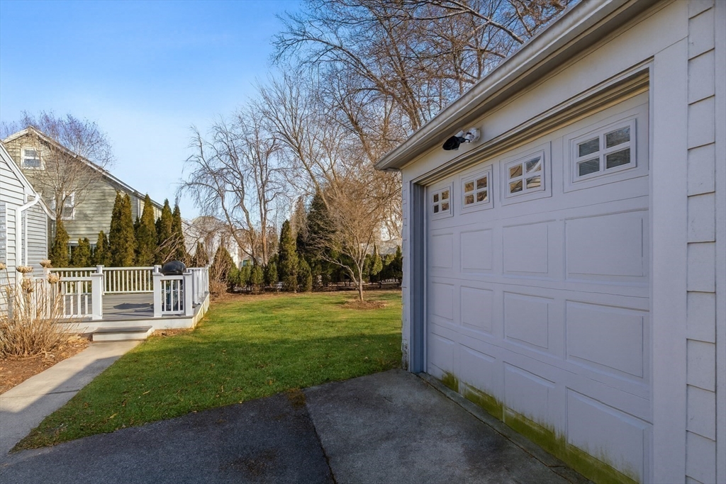 9 Wildwood Road Medford, MA 02155 - Photo 35 of 38 a front view of a house with a yard