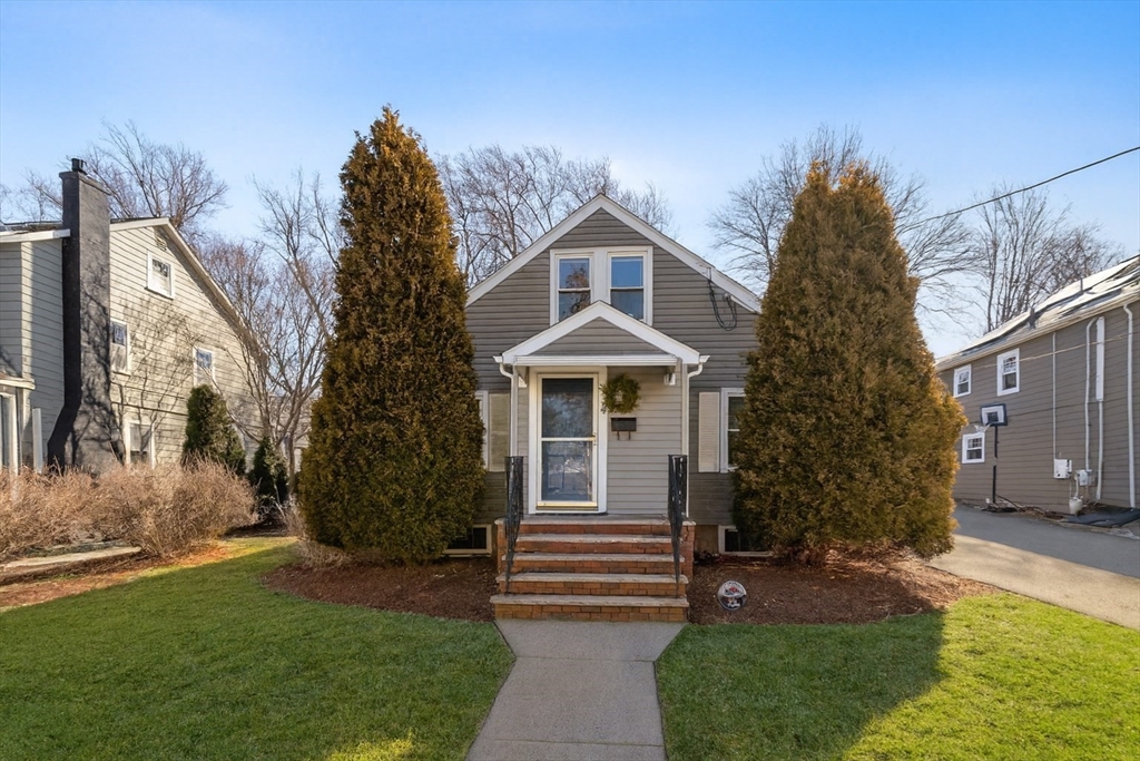 9 Wildwood Road Medford, MA 02155 - Photo 36 of 38 a front view of a house with garden