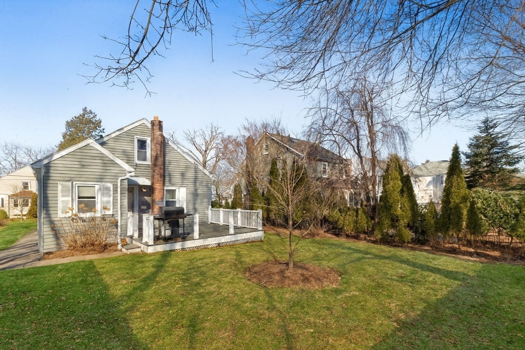 9 Wildwood Road Medford, MA 02155 - Photo 4 of 38 a view of a big yard in front of a house