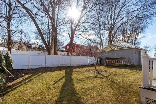 a view of a swimming pool with an outdoor seating