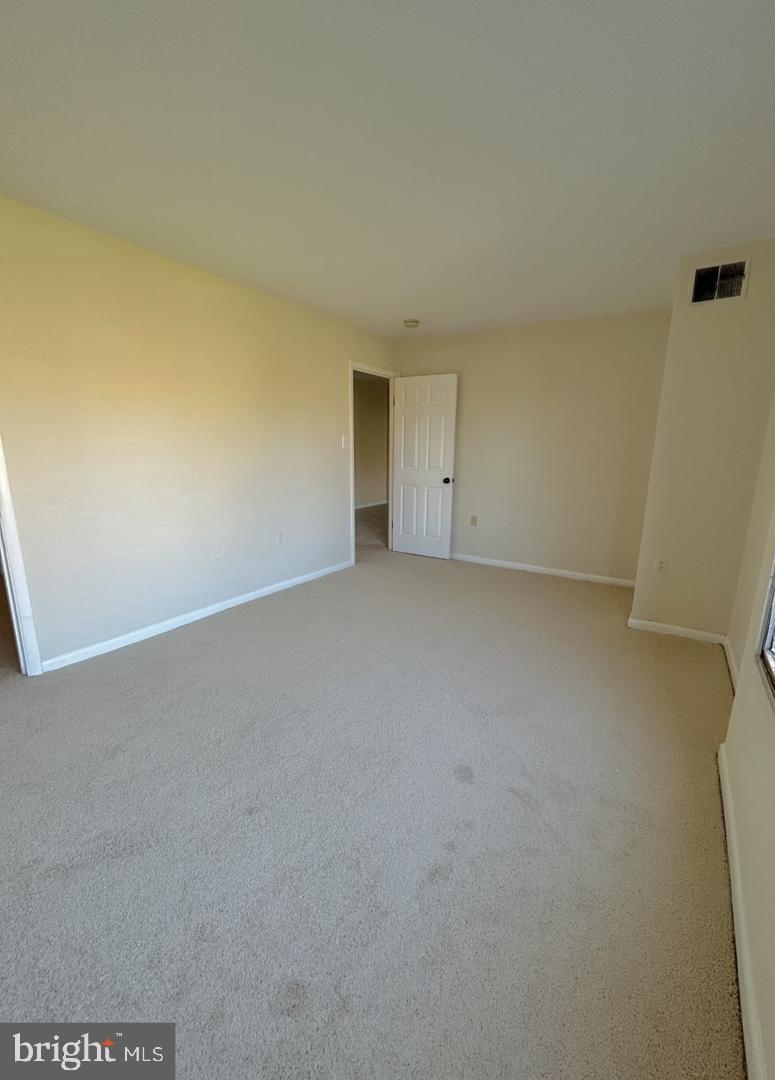 15716 Dorset Road, Unit 101 Laurel, MD 20707 - Photo 4 of 5 a view of empty room