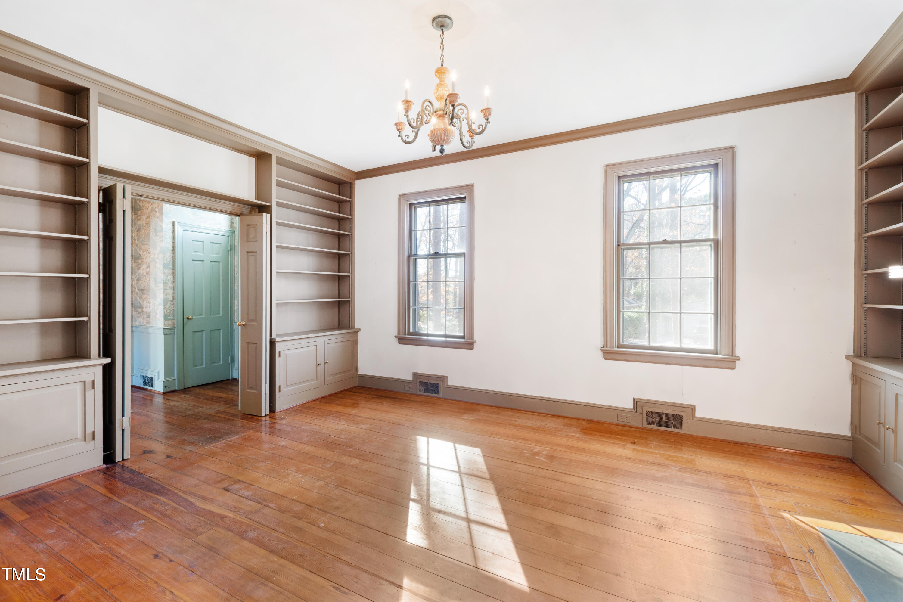 2522 Wake Drive Raleigh, NC 27608 - Photo 14 of 49 an empty room with windows and closet