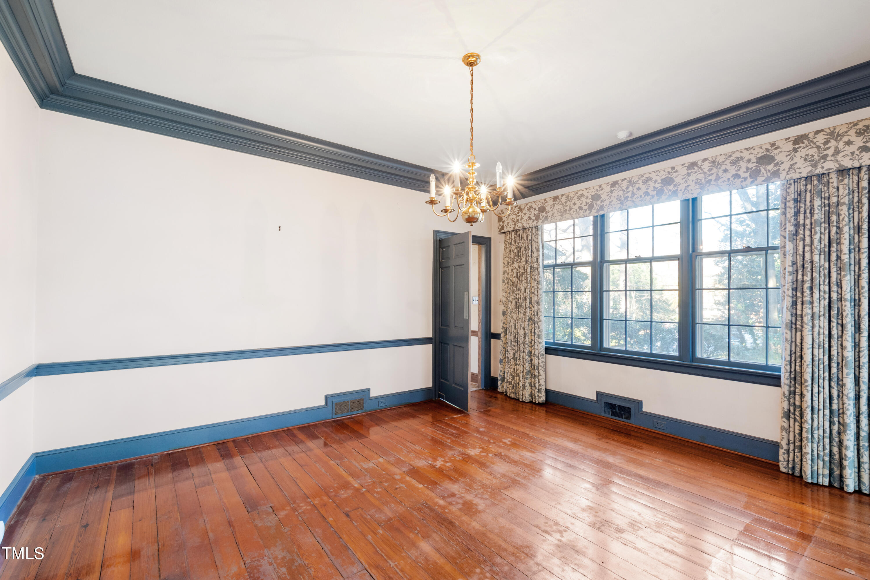 2522 Wake Drive Raleigh, NC 27608 - Photo 16 of 49 a view of an empty room with a window