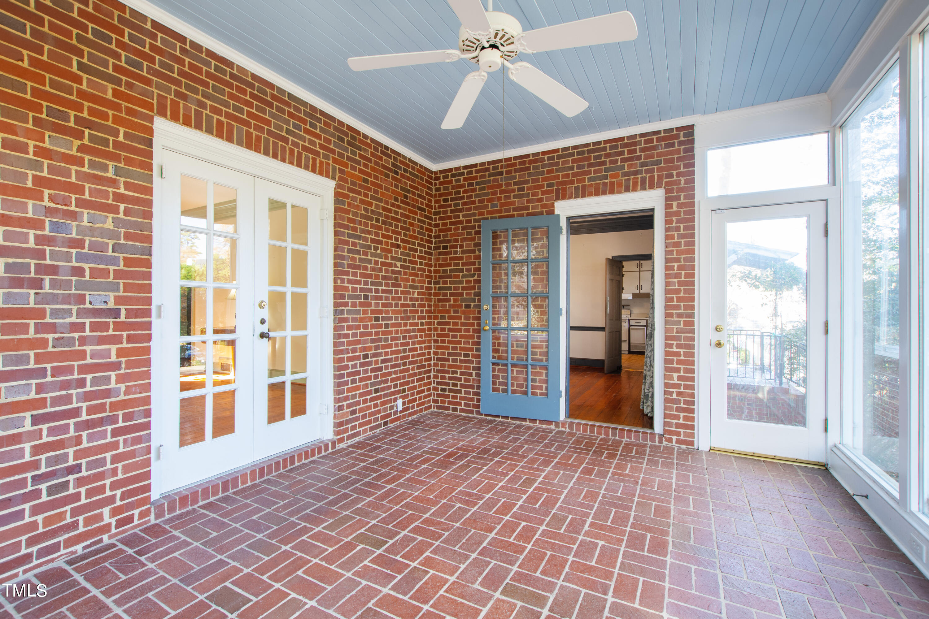 2522 Wake Drive Raleigh, NC 27608 - Photo 22 of 49 a view of a brick house with a large window