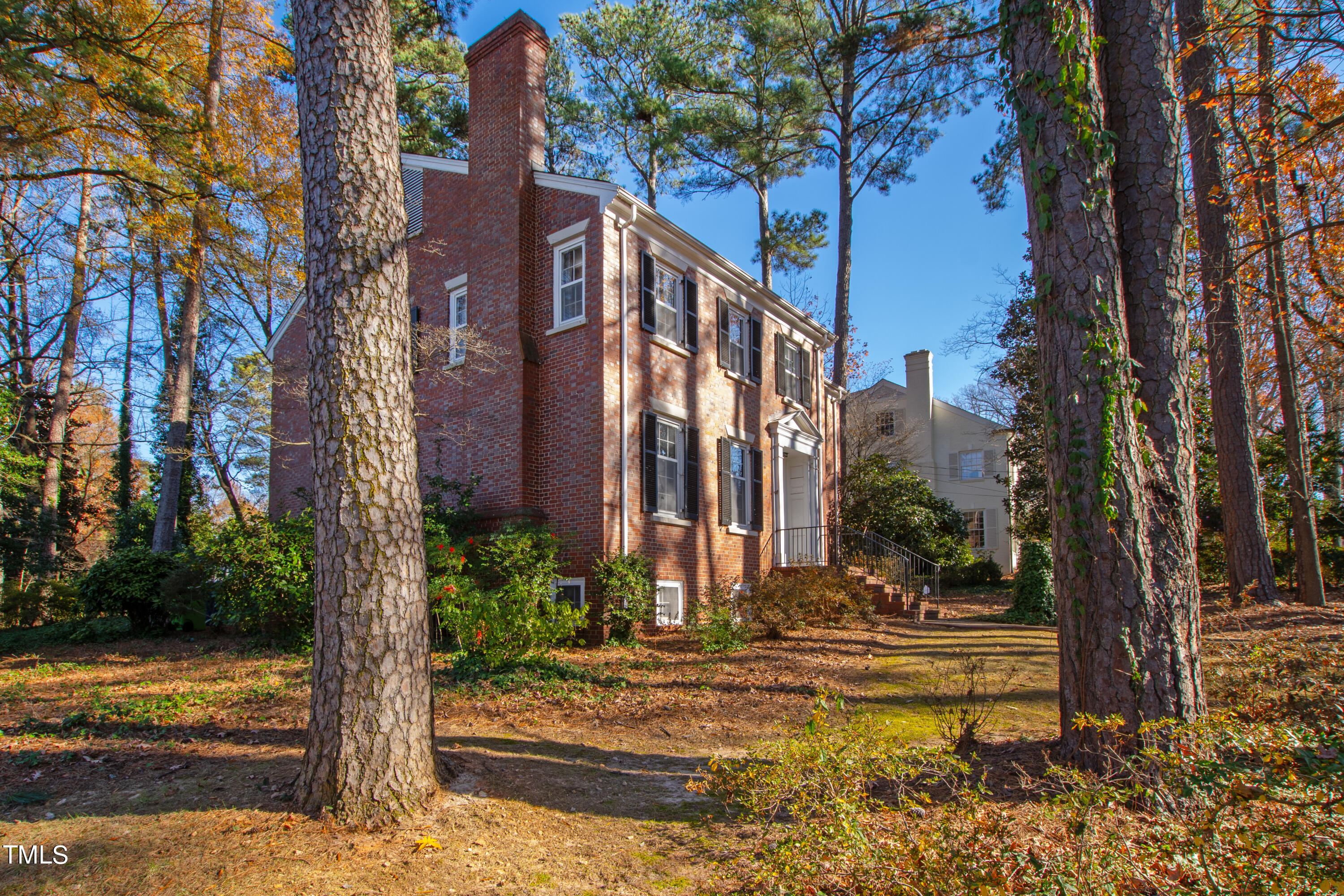 2522 Wake Drive Raleigh, NC 27608 - Photo 3 of 49 a view of a building with trees