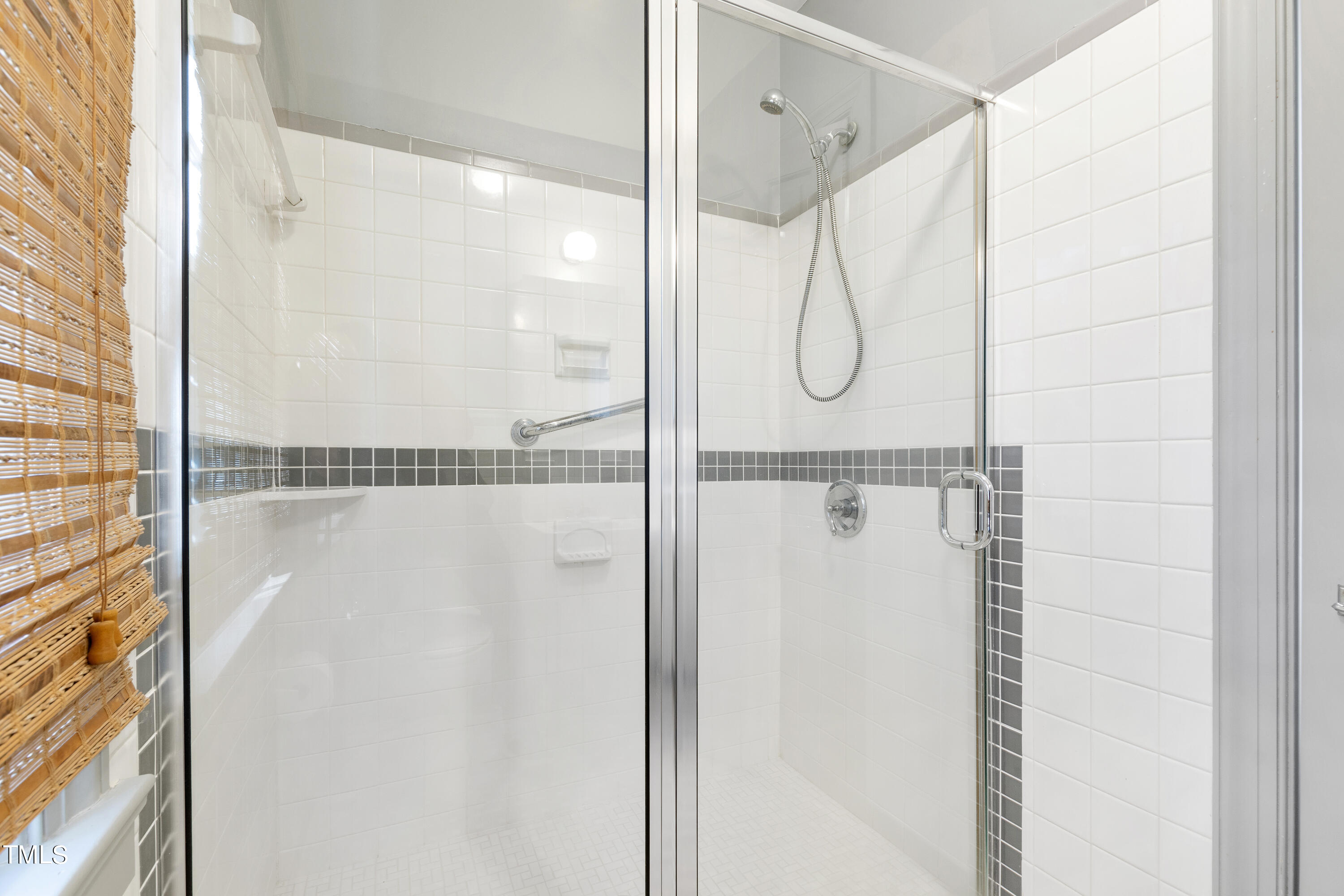 2522 Wake Drive Raleigh, NC 27608 - Photo 34 of 49 a bathroom with a glass shower door