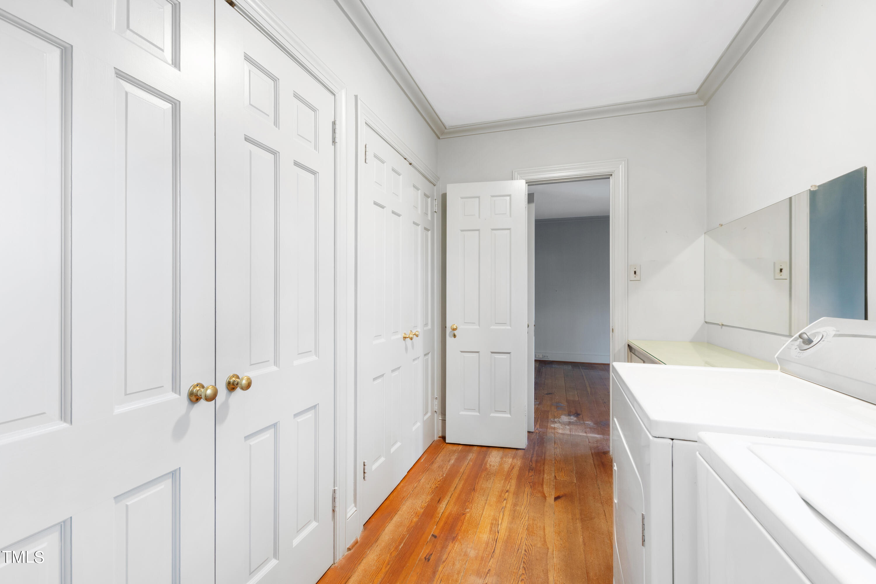 2522 Wake Drive Raleigh, NC 27608 - Photo 39 of 49 a view of a hallway with washer and dryer