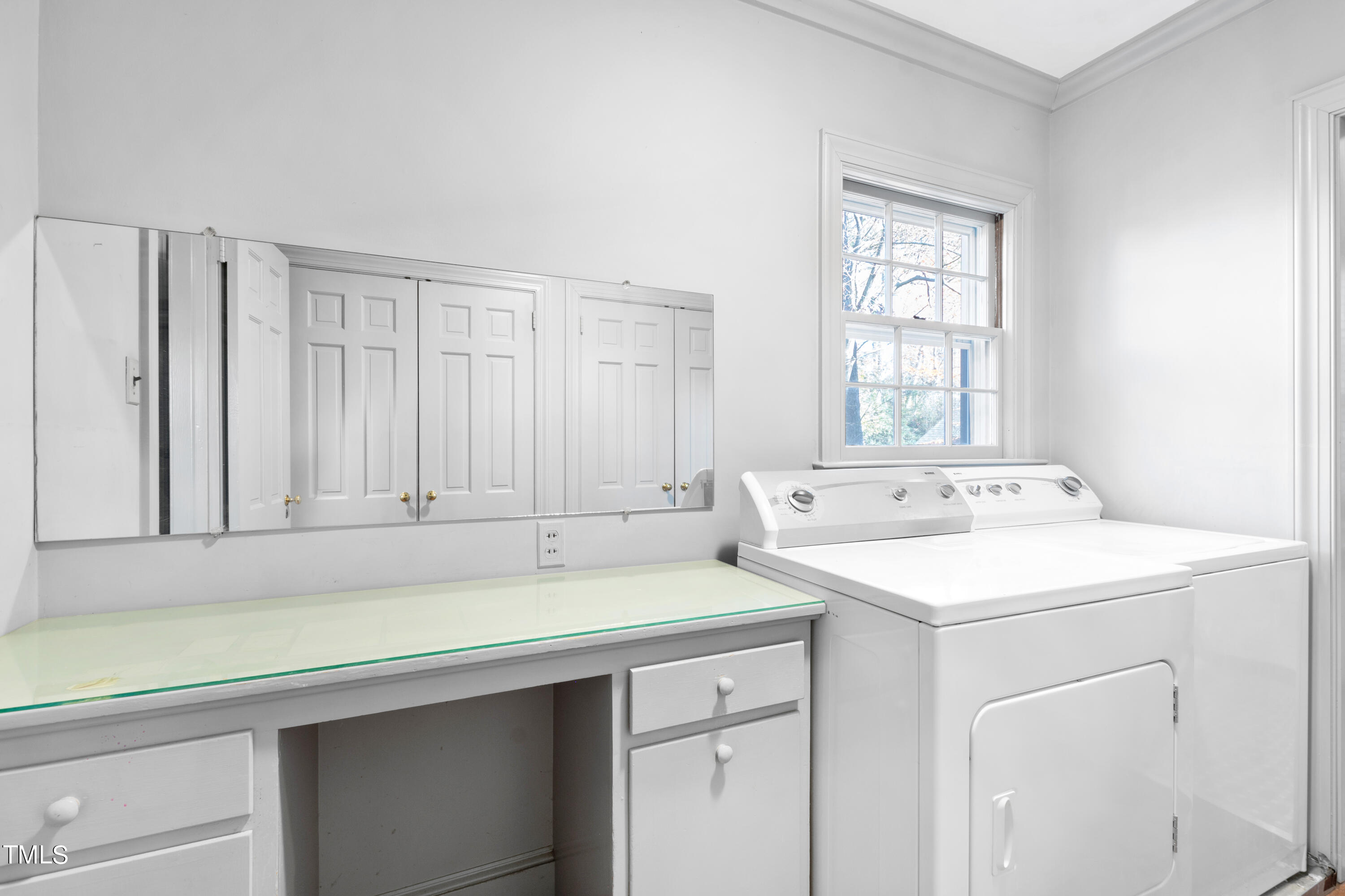 2522 Wake Drive Raleigh, NC 27608 - Photo 40 of 49 a utility room with a sink washer and dryer