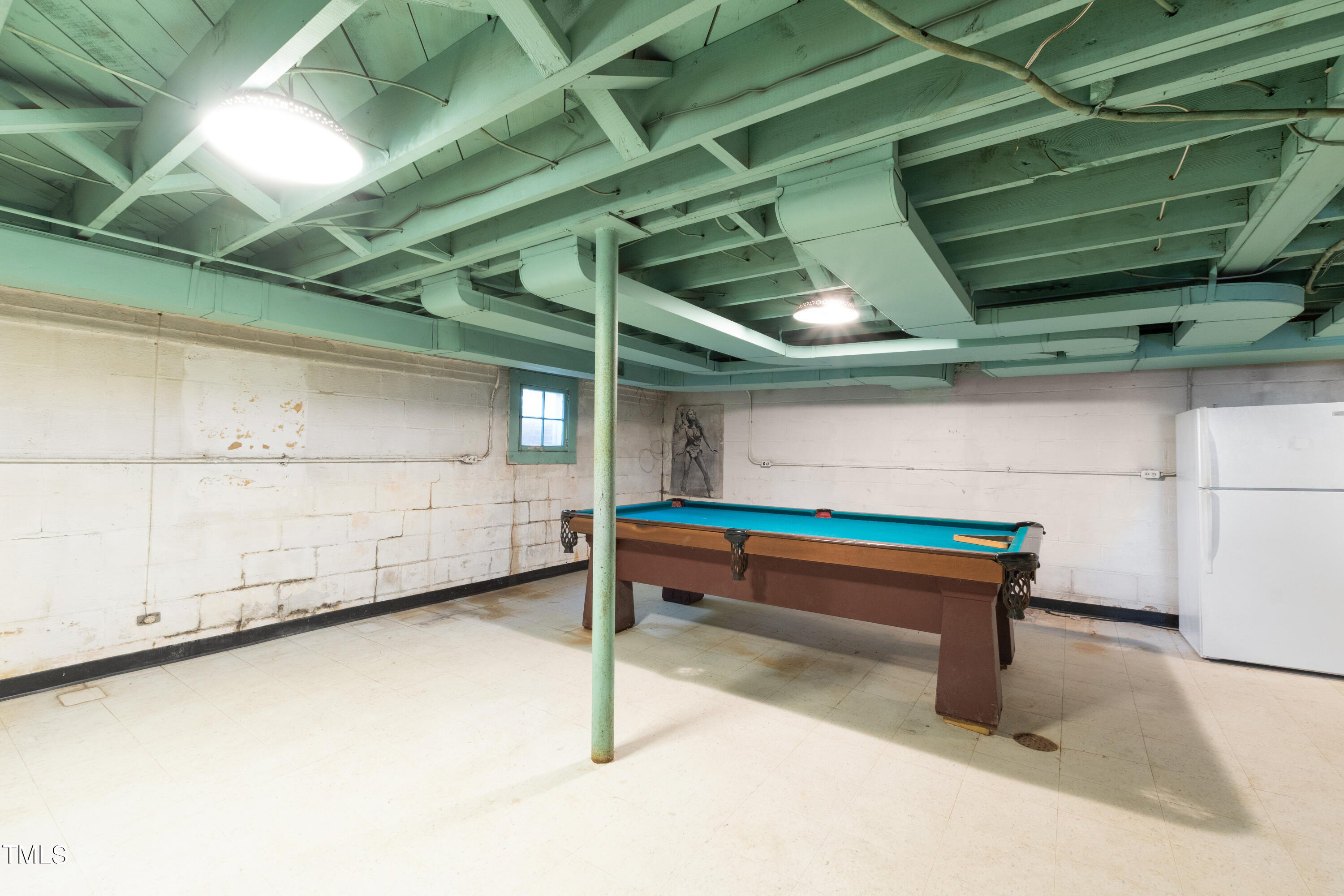 2522 Wake Drive Raleigh, NC 27608 - Photo 43 of 49 a sitting area with wooden walls