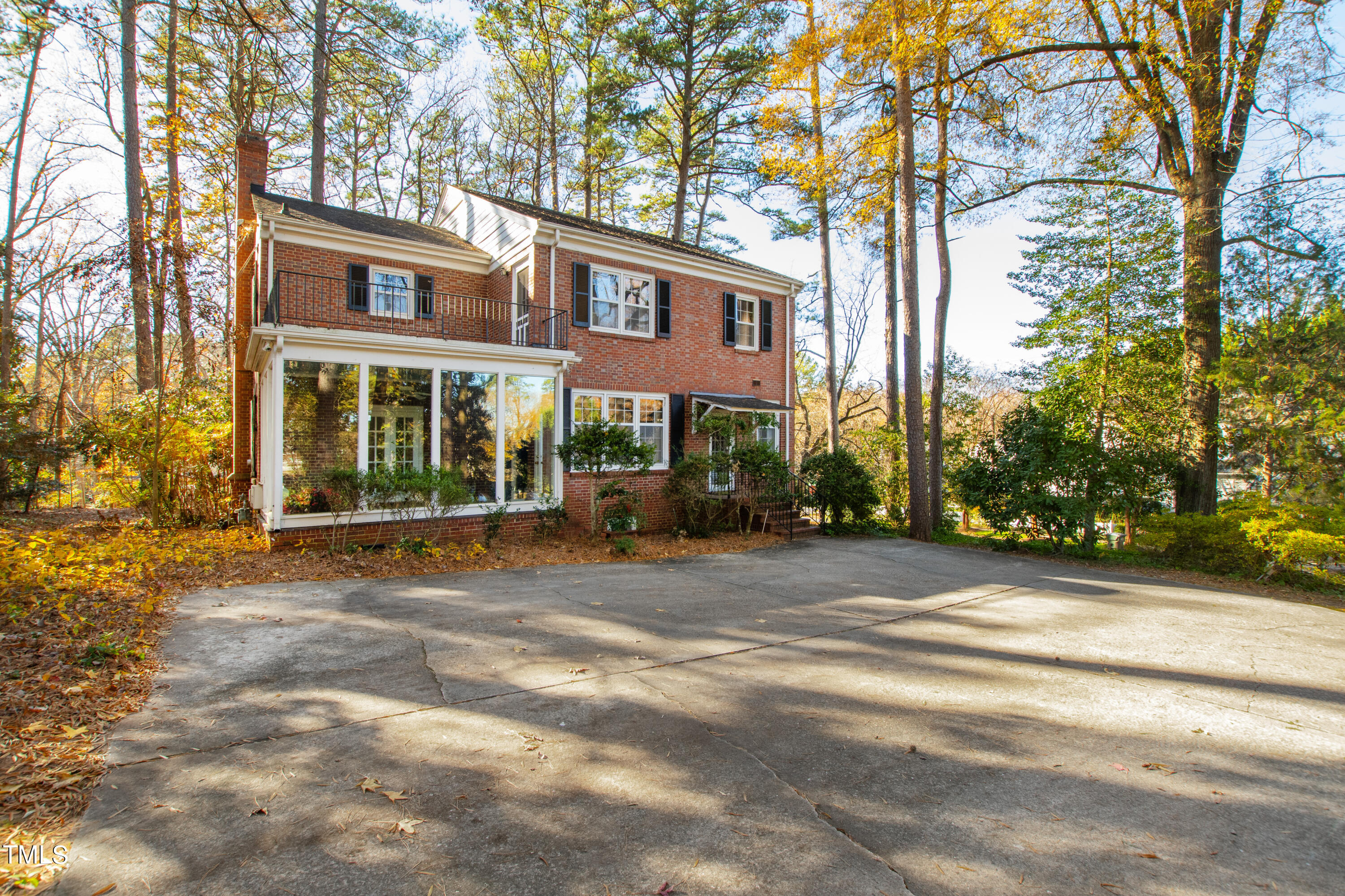 2522 Wake Drive Raleigh, NC 27608 - Photo 46 of 49 a view of a building with a tree in front