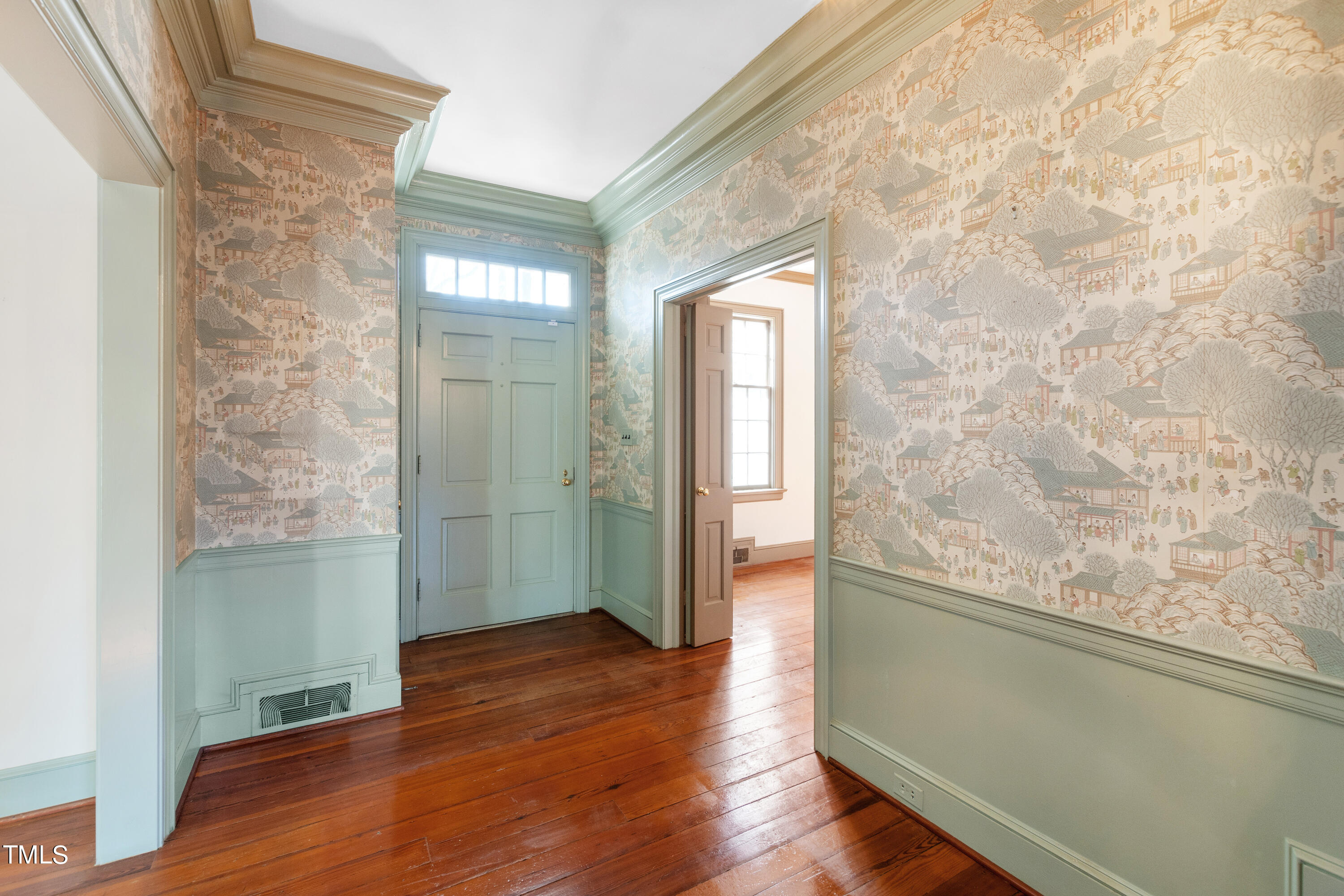 2522 Wake Drive Raleigh, NC 27608 - Photo 6 of 49 a view of front door with wooden floor