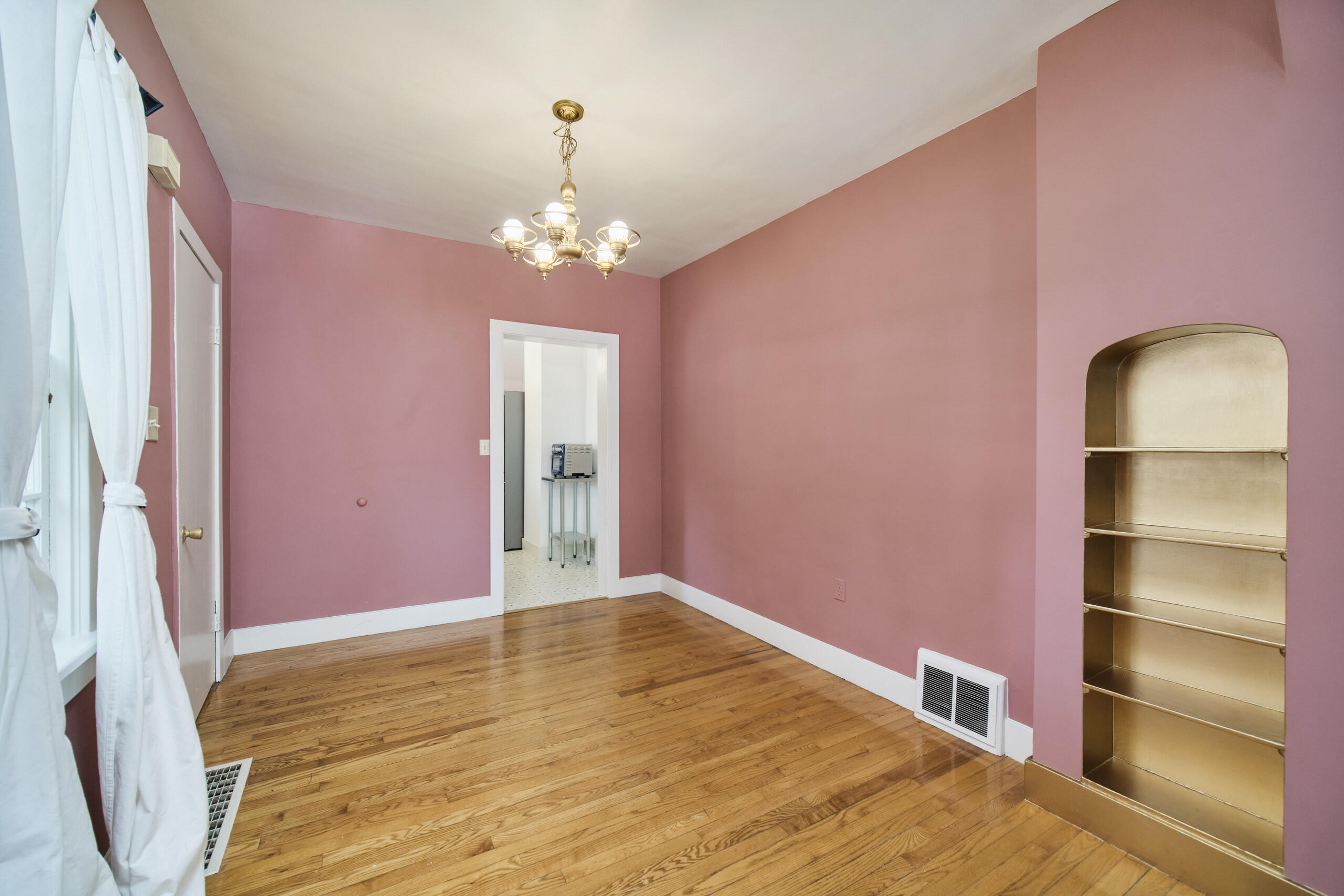 244 5th Street Manistee, MI 49660 - Photo 5 of 45 Dining area has built-in bookcases