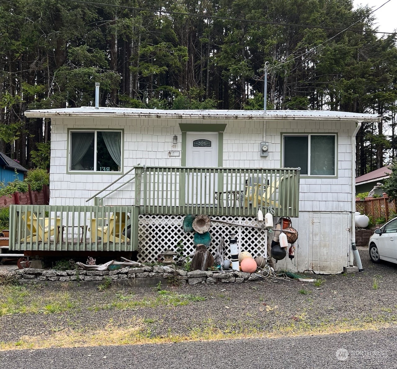 a front view of a house with glass windows
