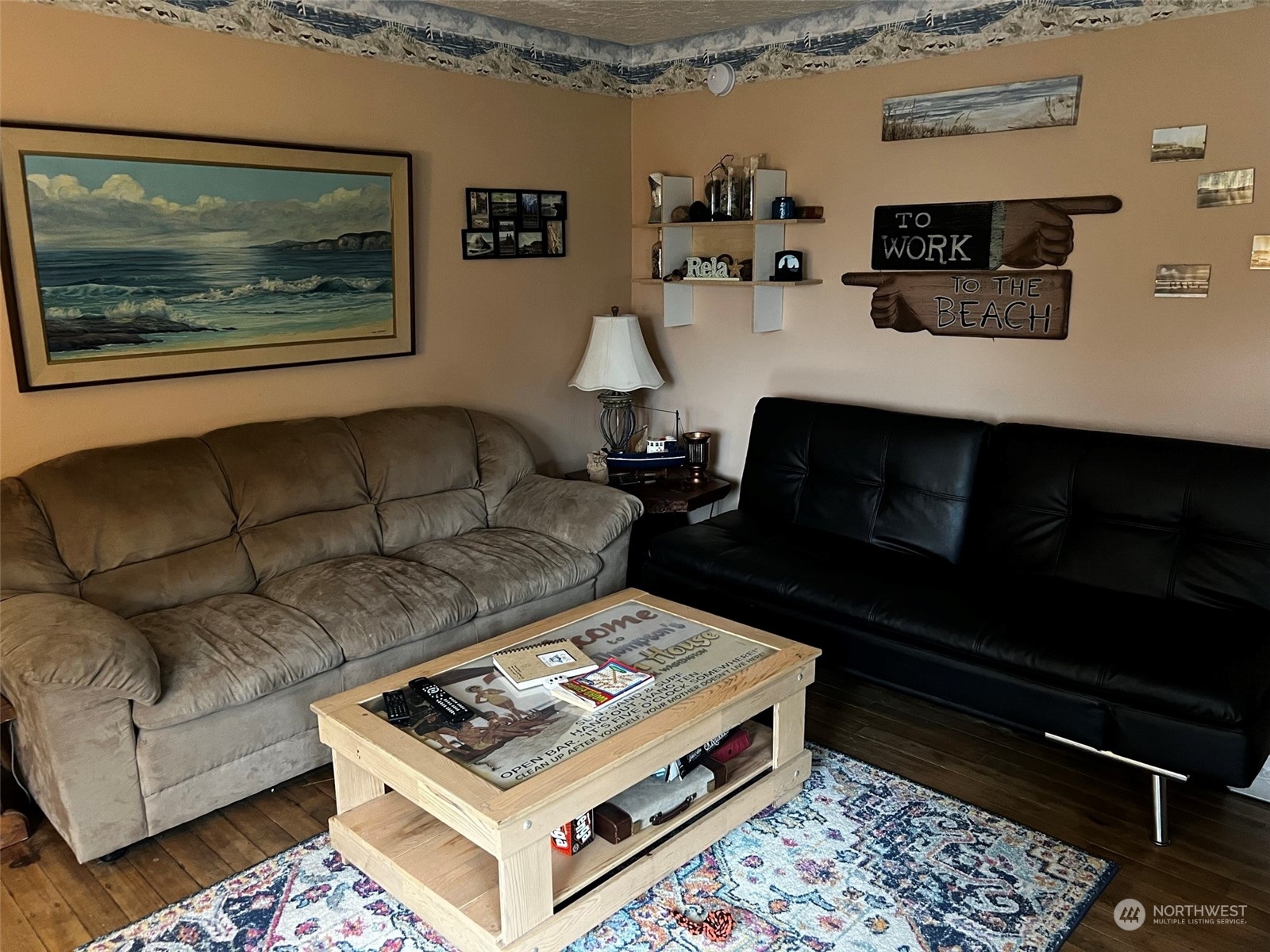 41 4th Street Pacific Beach, WA 98571 - Photo 11 of 23 a living room with furniture and a flat screen tv