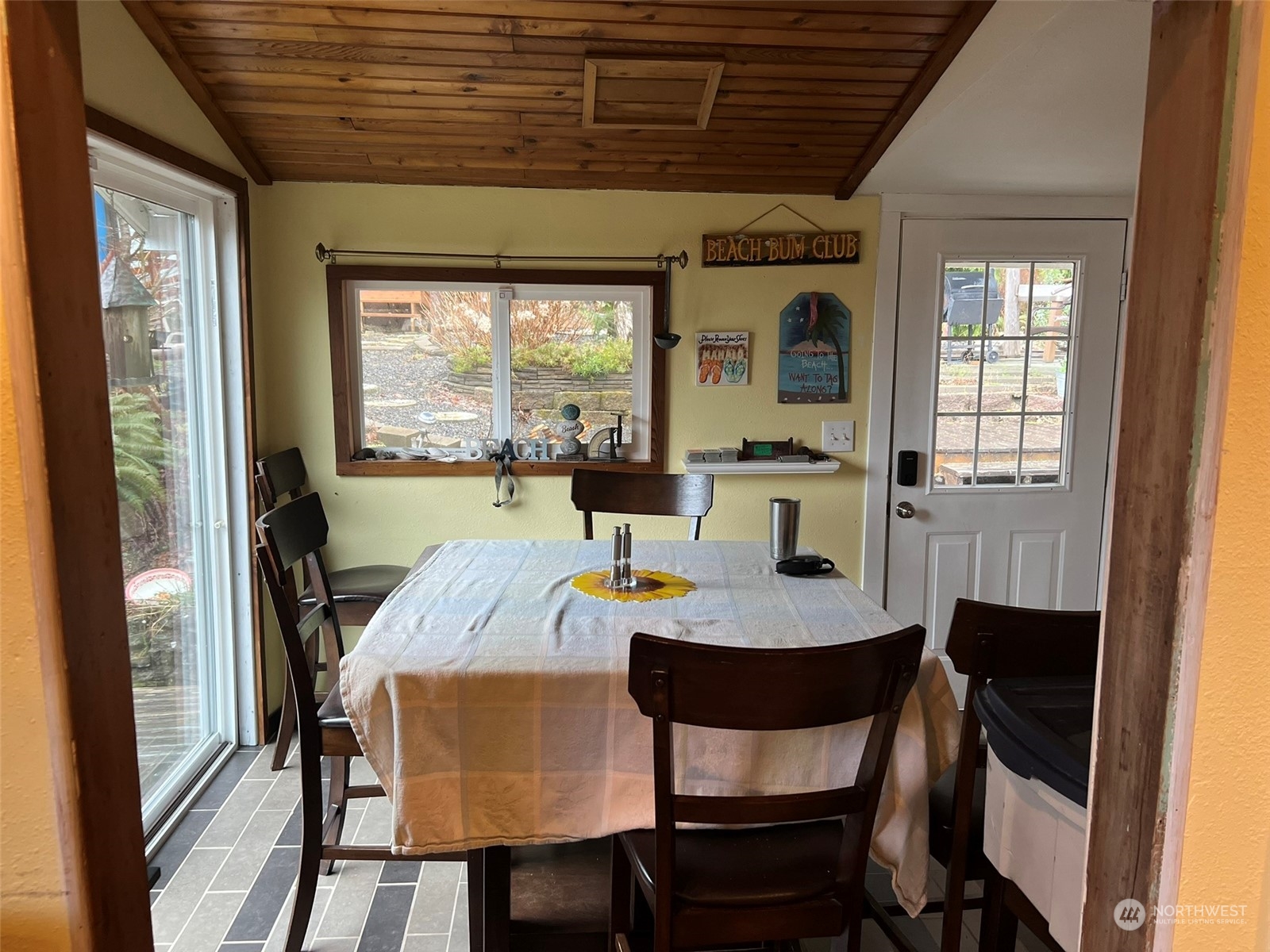 41 4th Street Pacific Beach, WA 98571 - Photo 15 of 23 a view of a dining room with furniture window and outside view