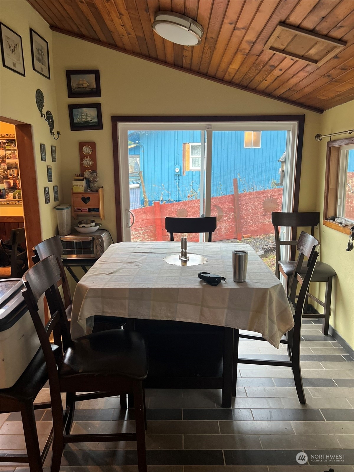 41 4th Street Pacific Beach, WA 98571 - Photo 16 of 23 a view of a dining room with furniture window and wooden floor