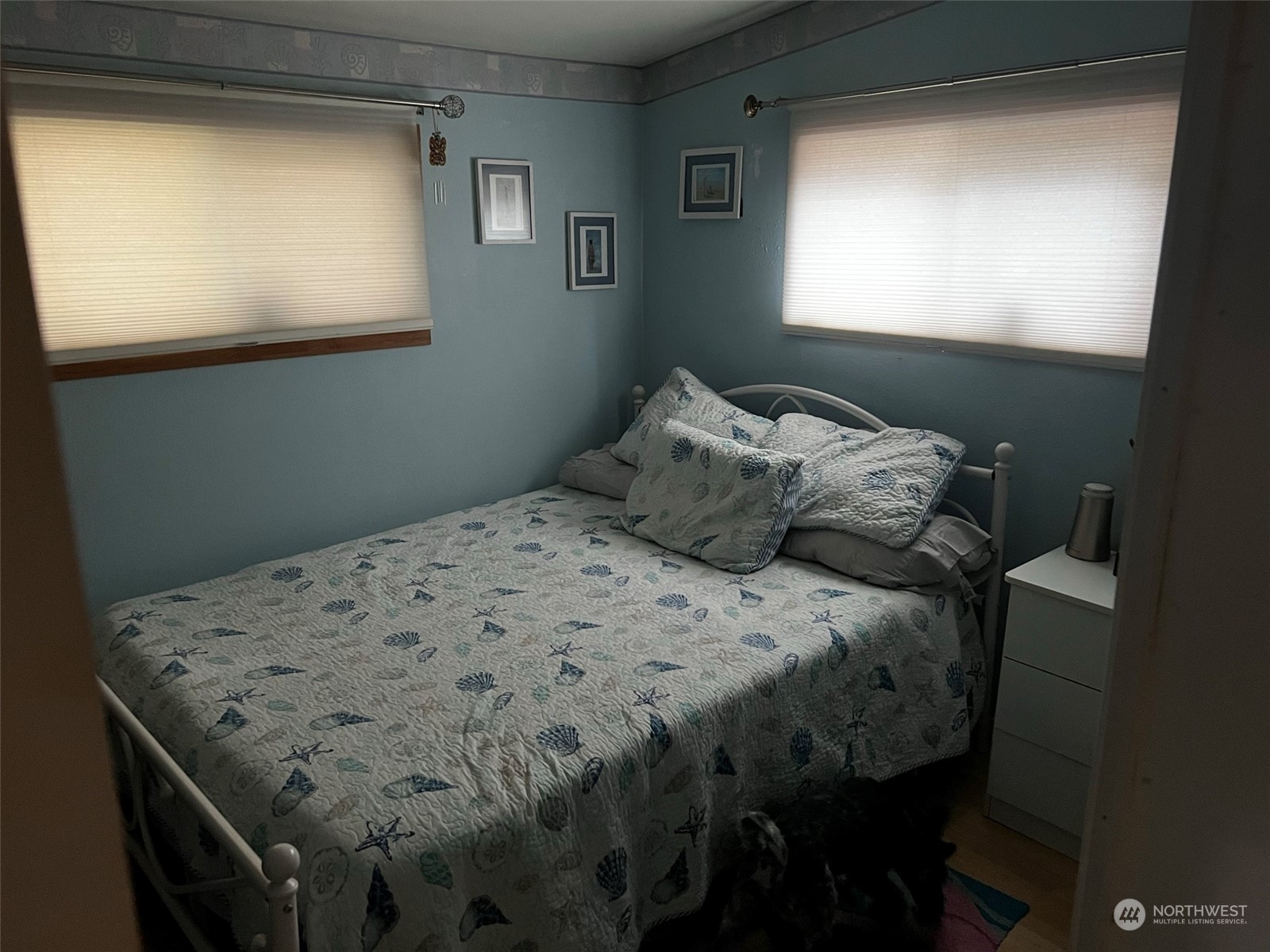 41 4th Street Pacific Beach, WA 98571 - Photo 20 of 23 a bedroom with a bed and a window