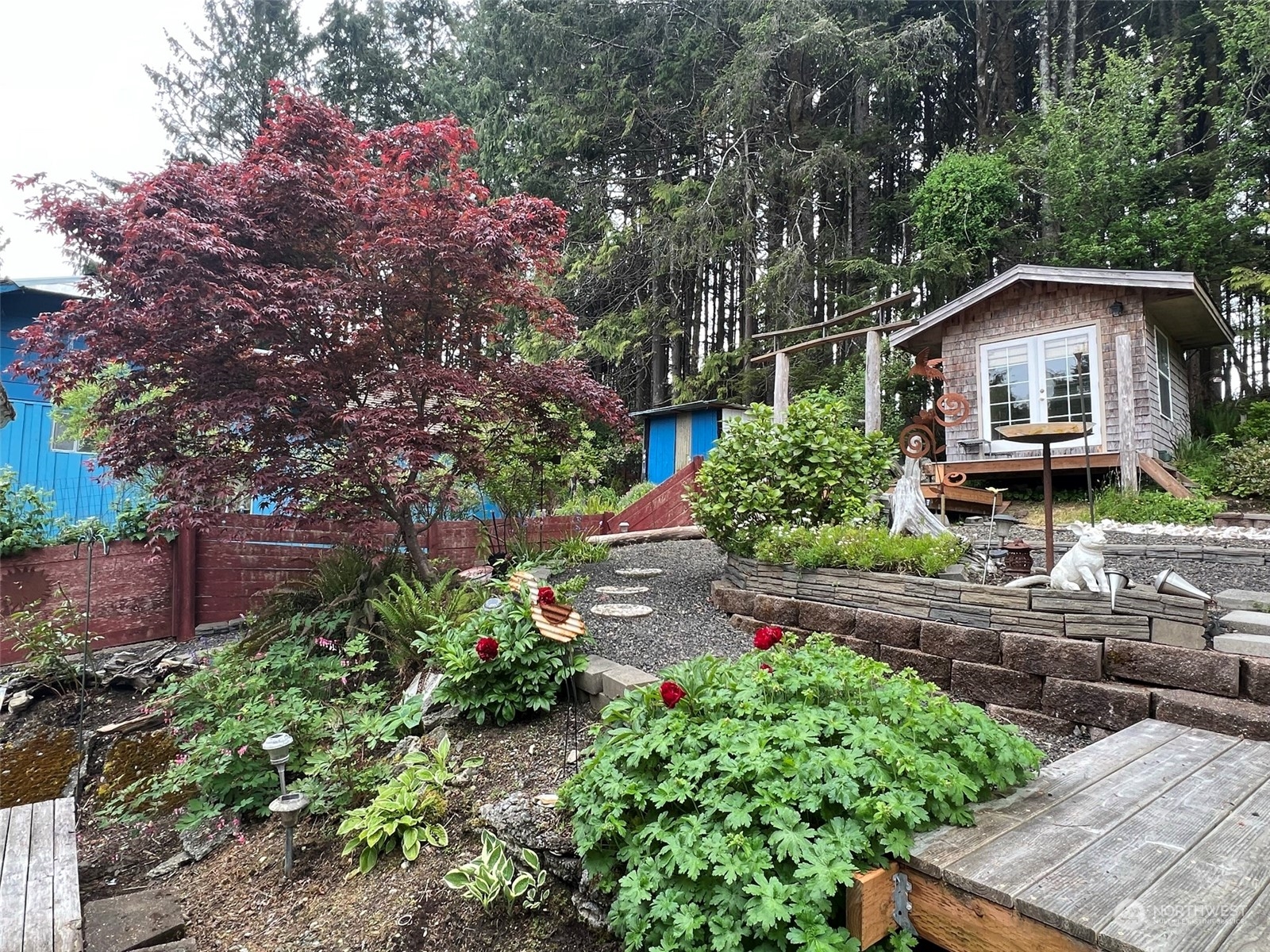41 4th Street Pacific Beach, WA 98571 - Photo 2 of 23 a front view of a house with a yard