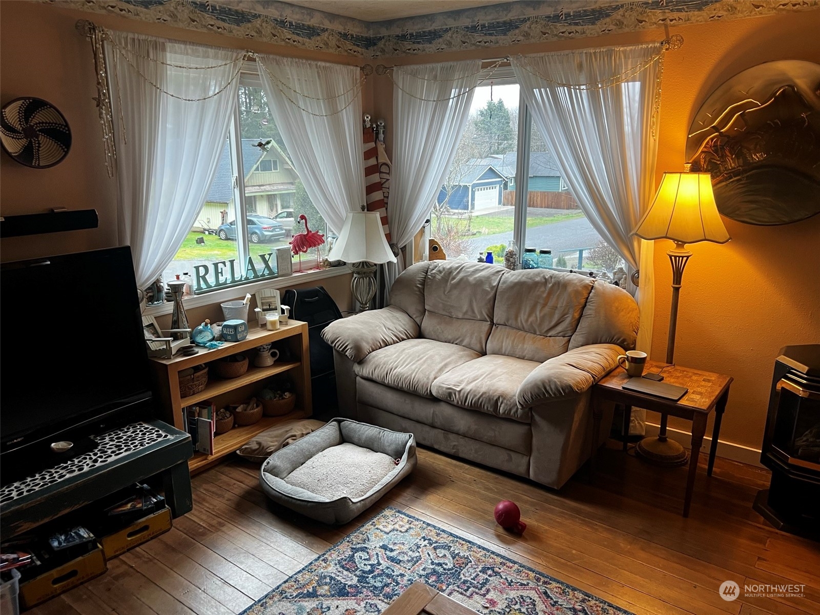 41 4th Street Pacific Beach, WA 98571 - Photo 9 of 23 a living room with furniture and a window