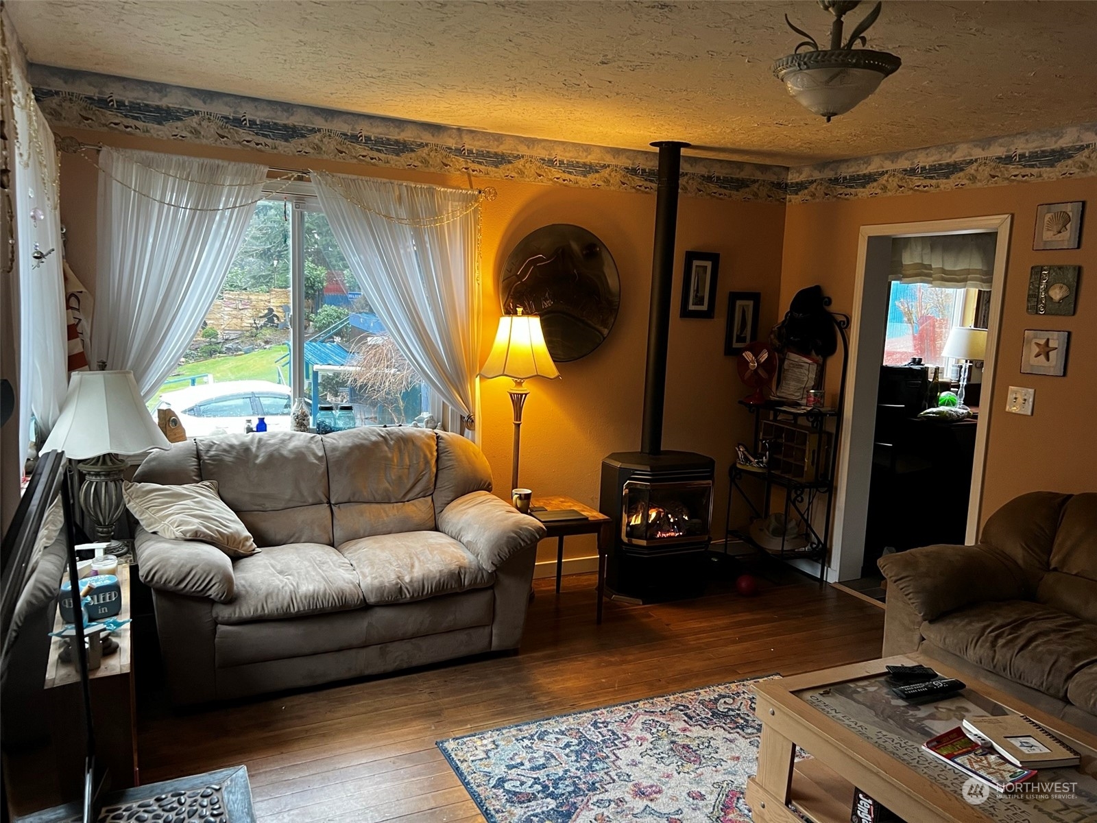 41 4th Street Pacific Beach, WA 98571 - Photo 10 of 23 a living room with furniture and a window