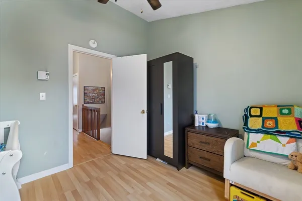 a workspace with furniture and wooden floor