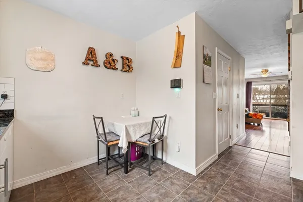 a view of livingroom with furniture and white walls