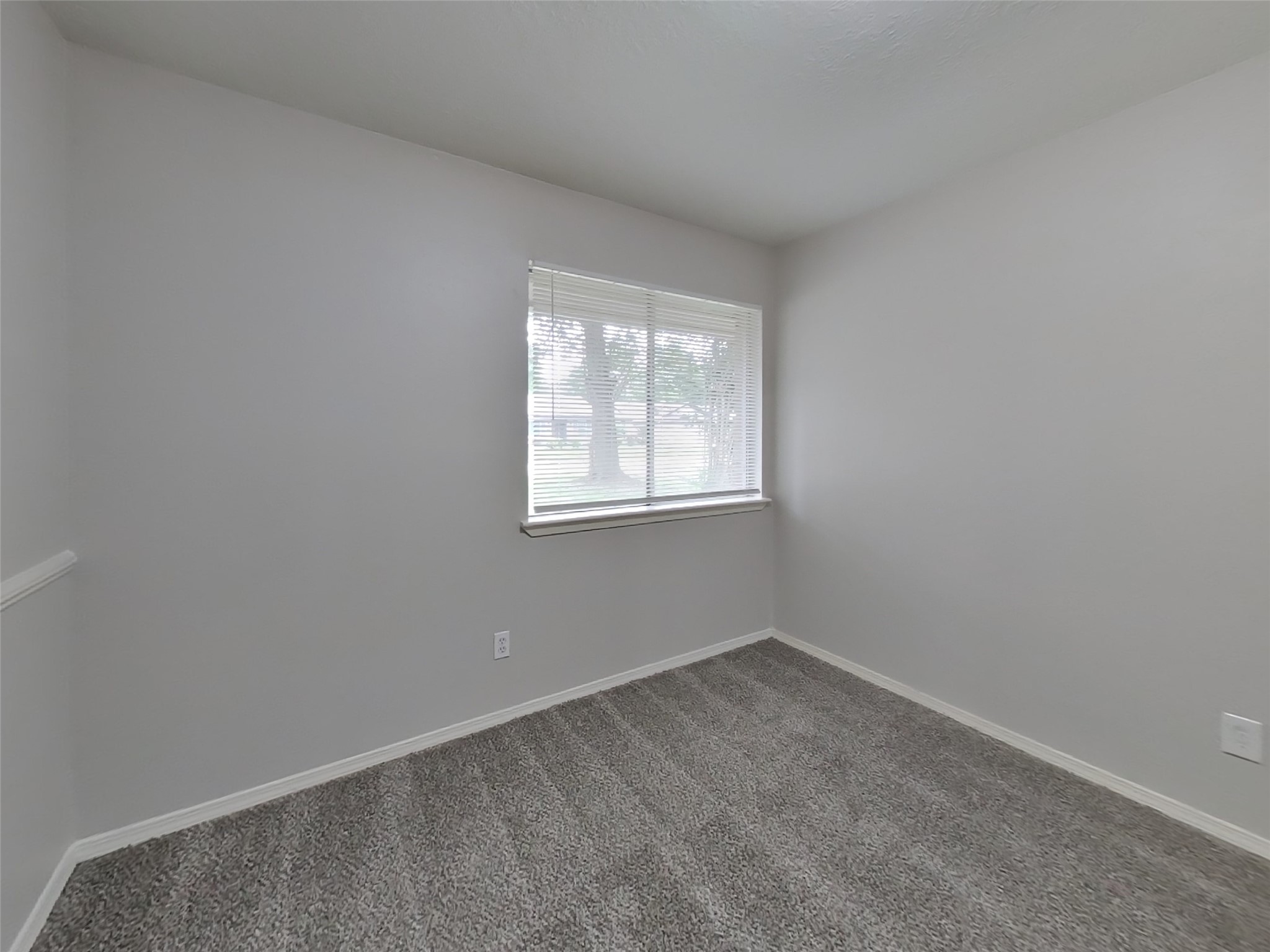 4422 Monteith Drive Spring, TX 77373 - Photo 14 of 18 an empty room with a window