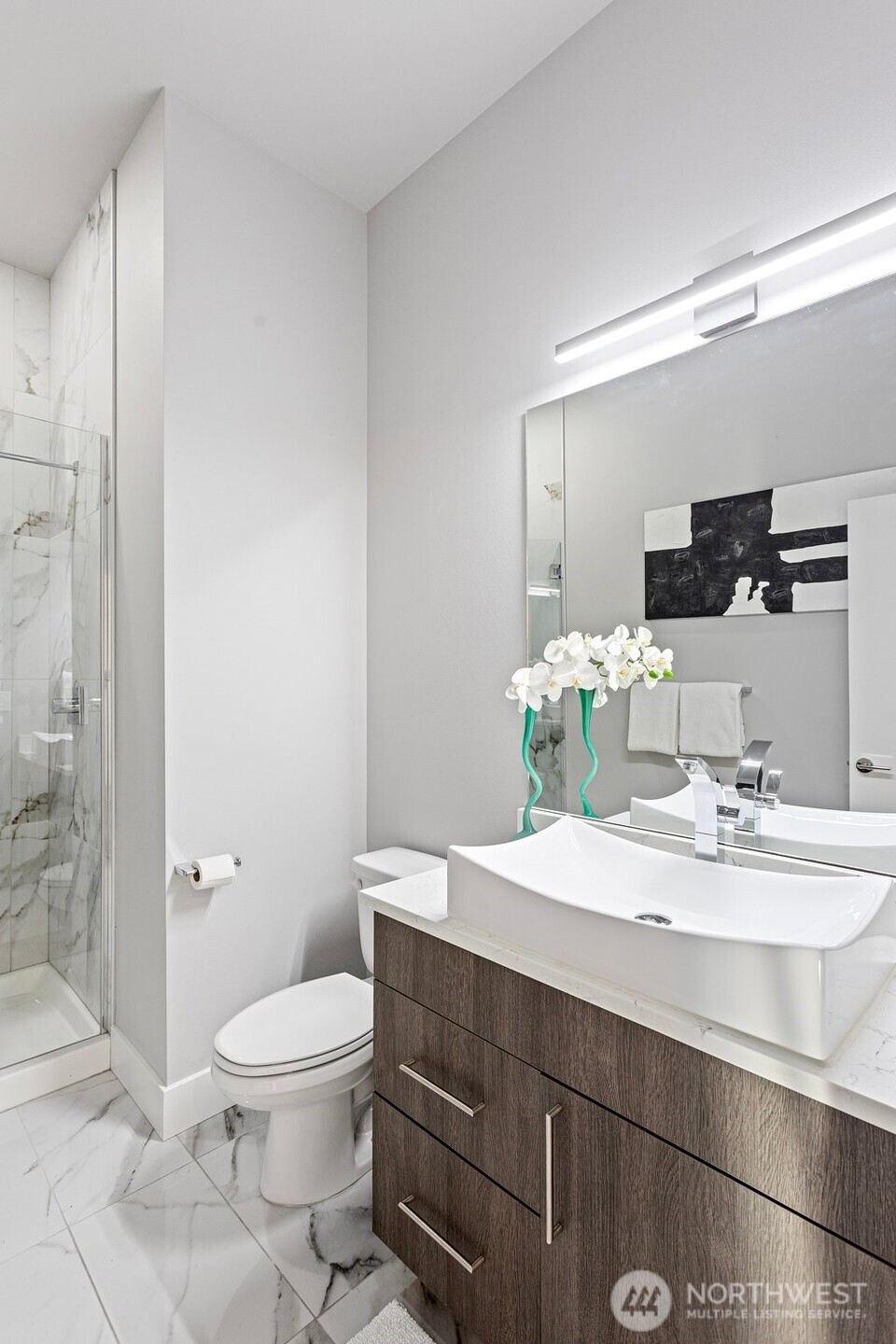 305 Stevens Avenue Southwest Renton, WA 98057 - Photo 17 of 40 a bathroom with a sink a toilet and shower