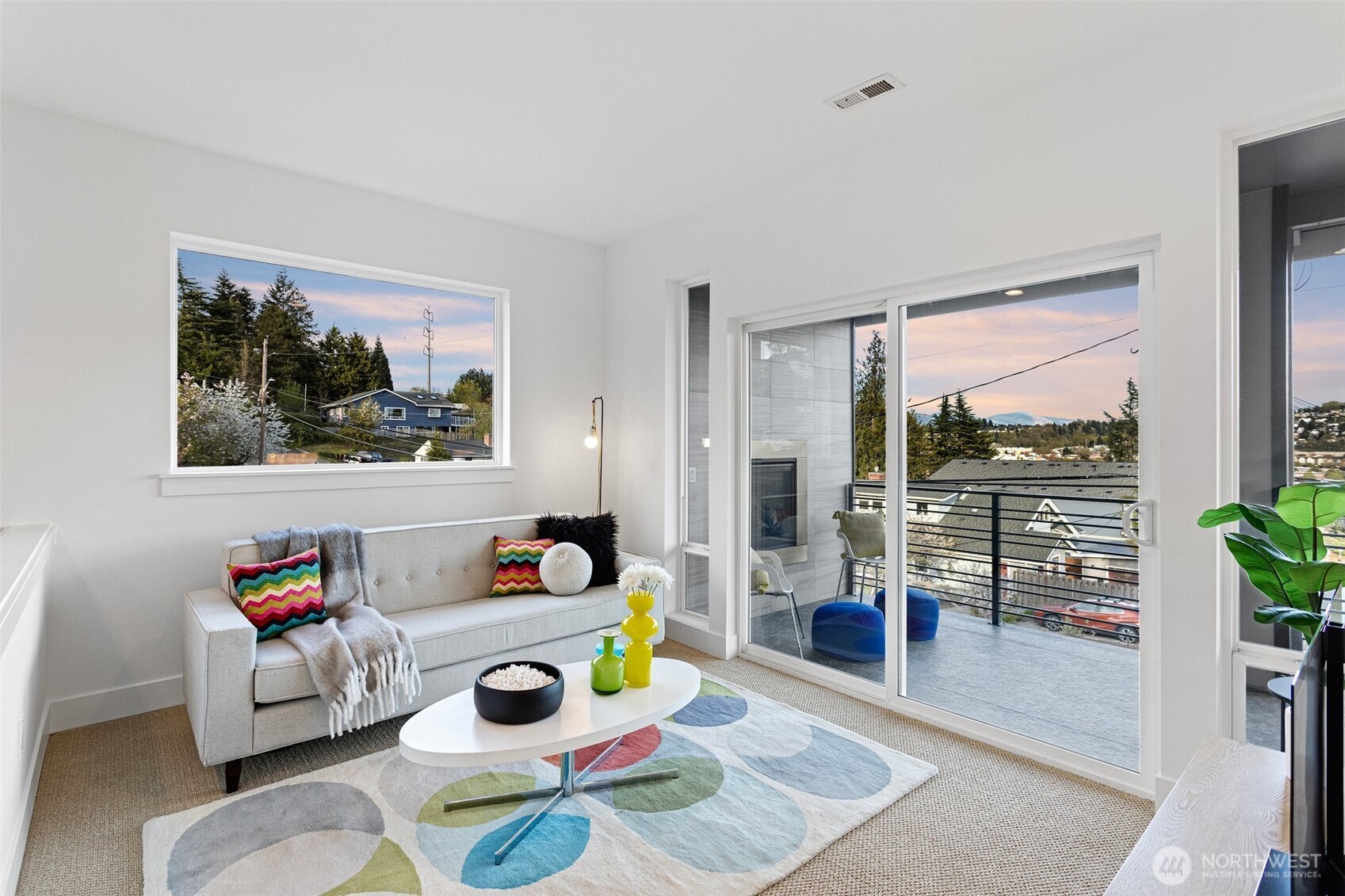 305 Stevens Avenue Southwest Renton, WA 98057 - Photo 19 of 40 a living room filled with furniture and a gate