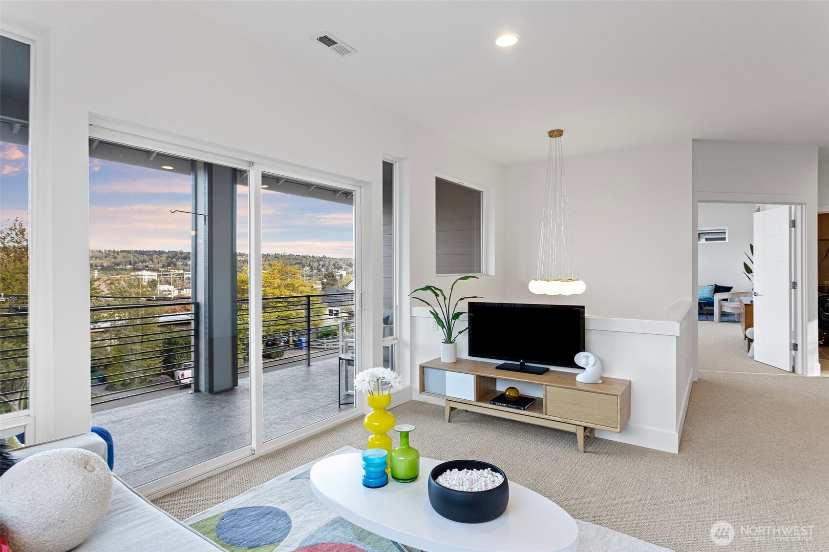 305 Stevens Avenue Southwest Renton, WA 98057 - Photo 22 of 40 a living room with furniture and a flat screen tv