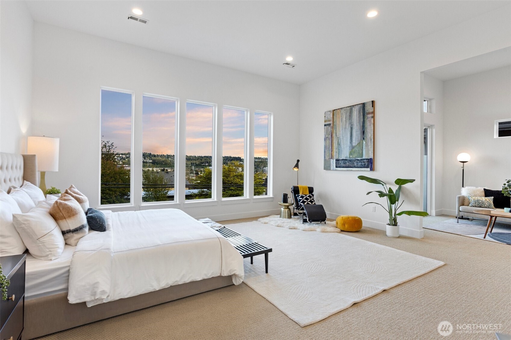 305 Stevens Avenue Southwest Renton, WA 98057 - Photo 23 of 40 a large bed sitting in a bedroom next to a window