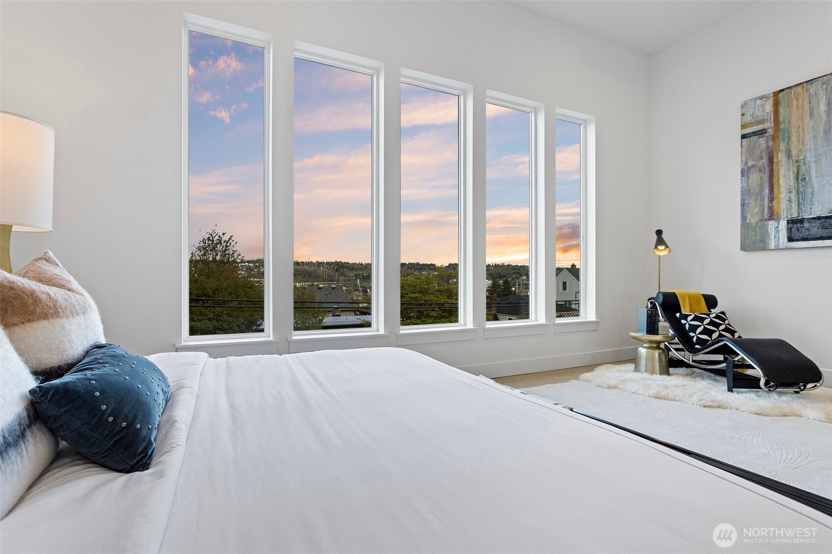 305 Stevens Avenue Southwest Renton, WA 98057 - Photo 24 of 40 a bed sitting in a bedroom next to a window