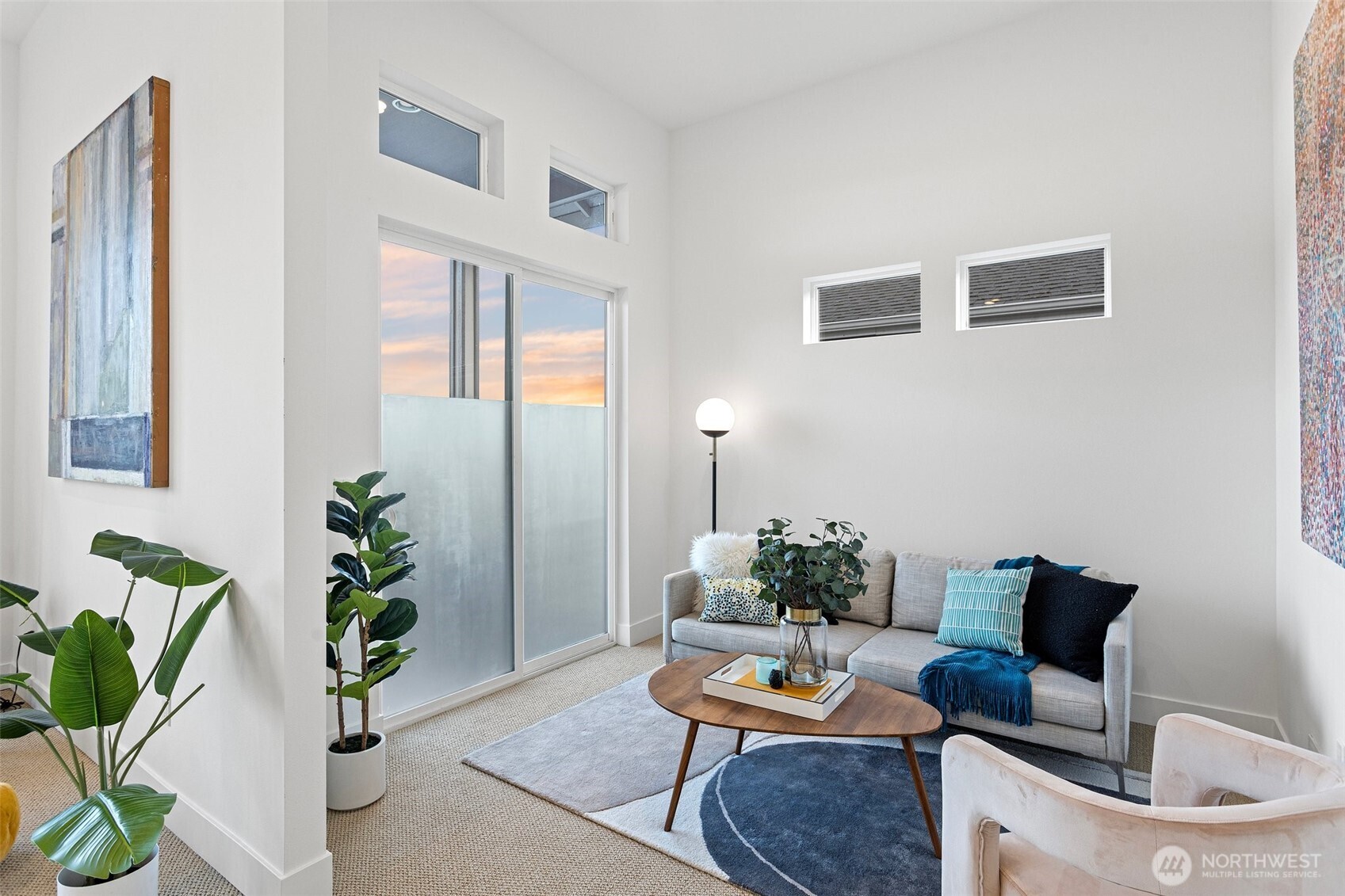 305 Stevens Avenue Southwest Renton, WA 98057 - Photo 26 of 40 a living room with furniture and a potted plant