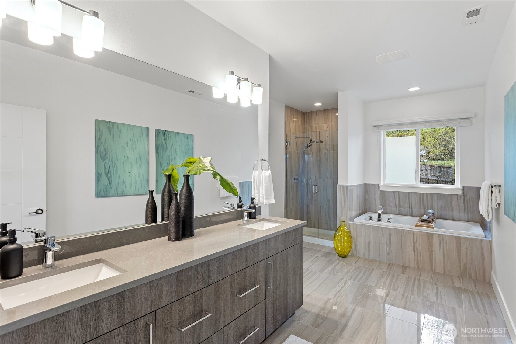 305 Stevens Avenue Southwest Renton, WA 98057 - Photo 29 of 40 a bathroom with a tub double vanity sink and a window