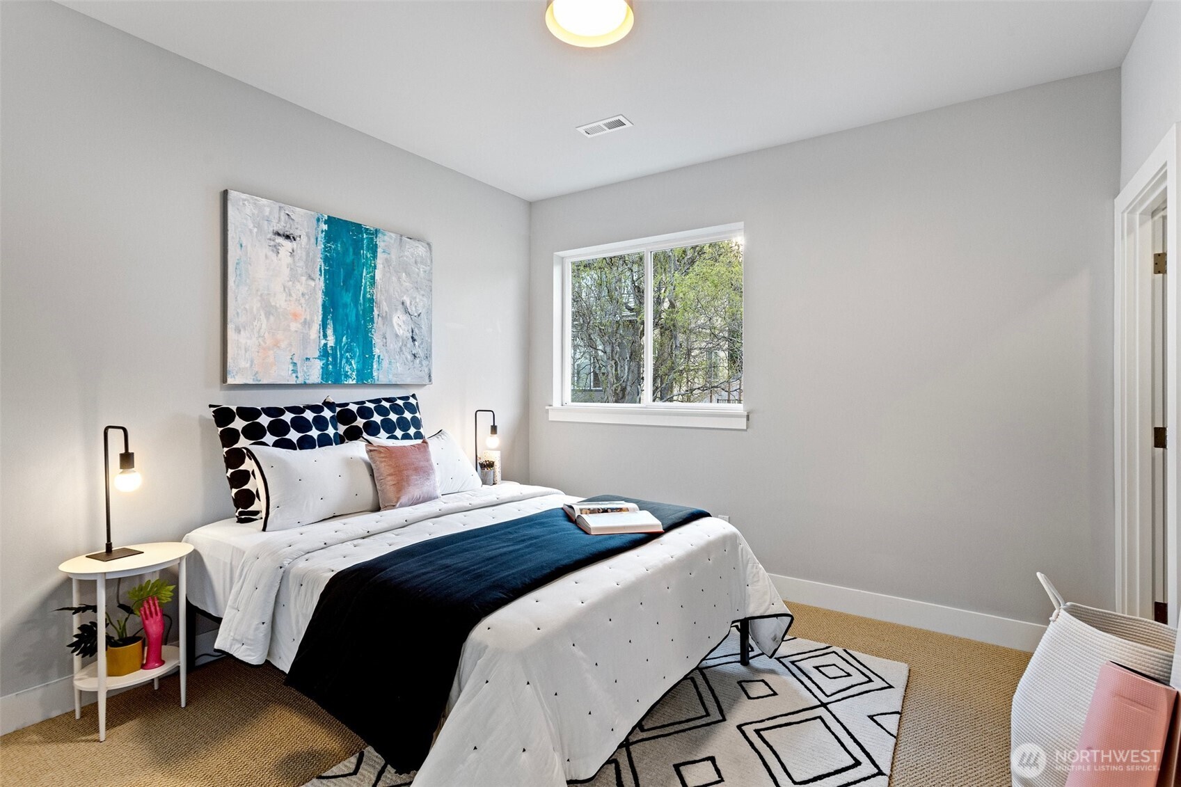 305 Stevens Avenue Southwest Renton, WA 98057 - Photo 31 of 40 a bedroom with a bed and a window