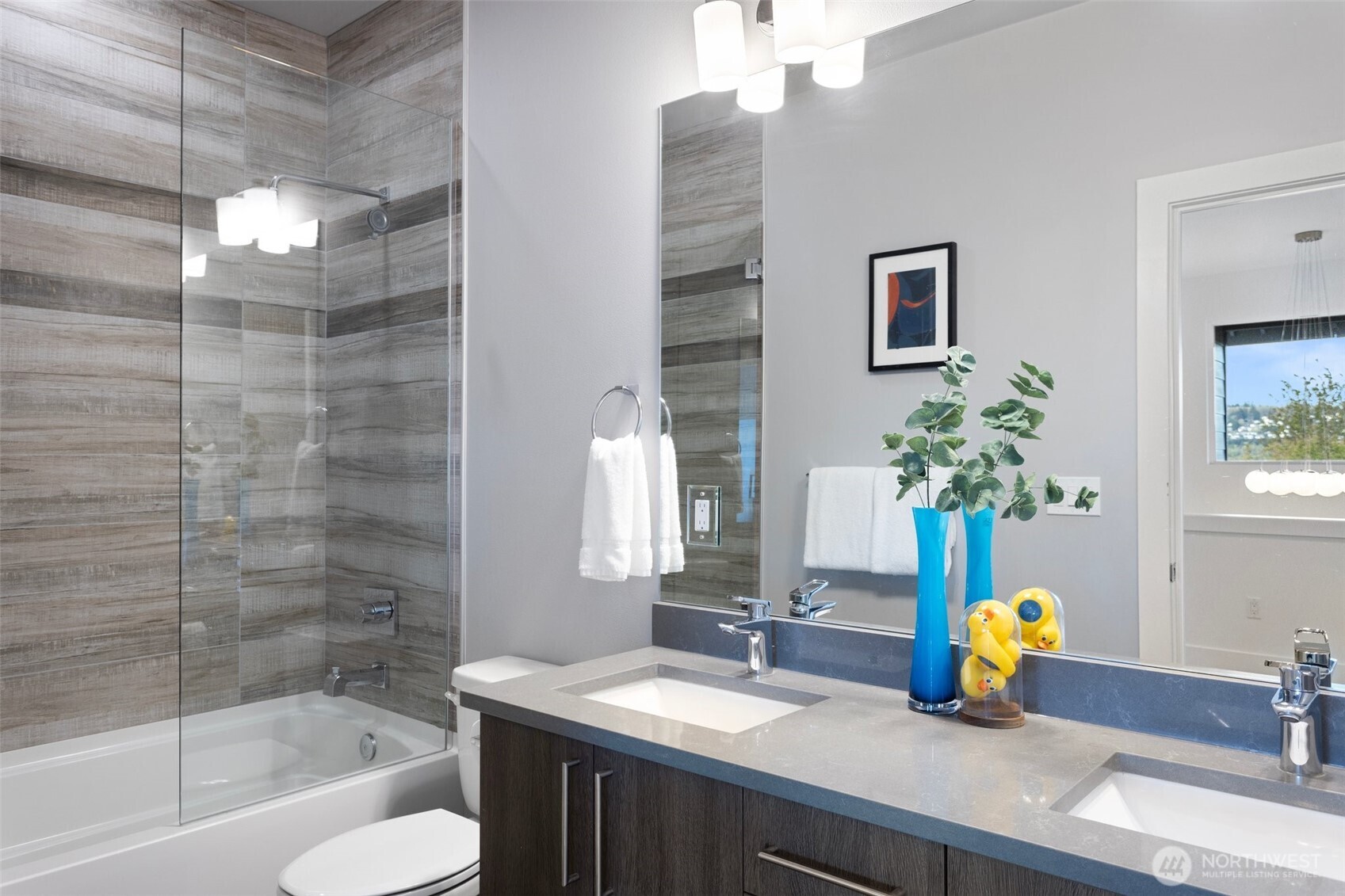 305 Stevens Avenue Southwest Renton, WA 98057 - Photo 32 of 40 a bathroom with a sink a bathtub and a shower