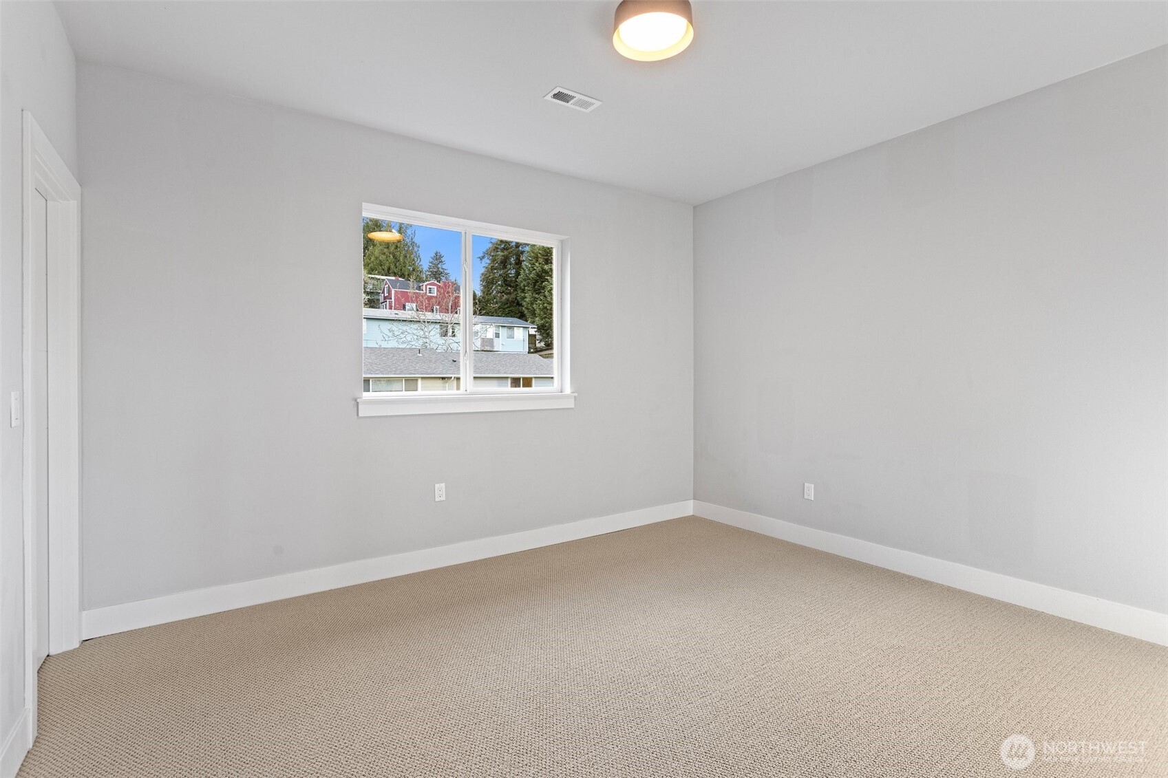 305 Stevens Avenue Southwest Renton, WA 98057 - Photo 34 of 40 an empty room with windows