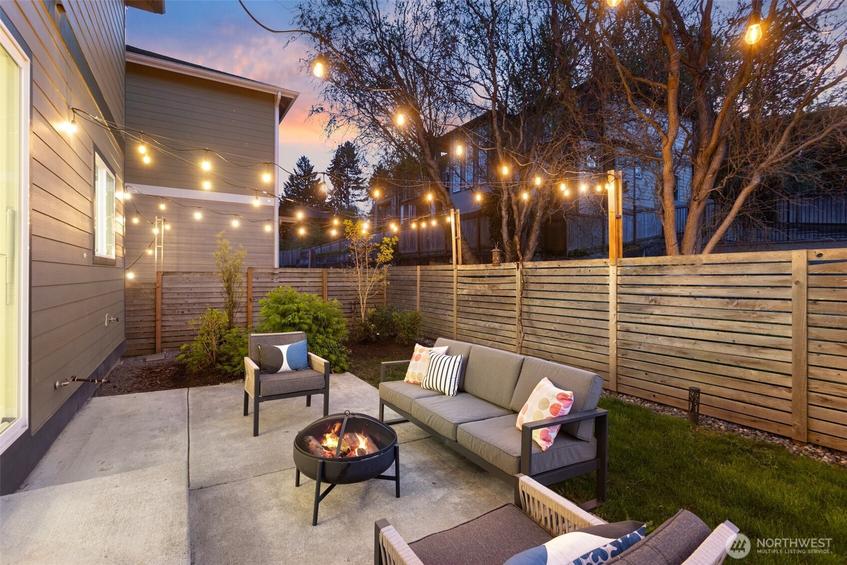 305 Stevens Avenue Southwest Renton, WA 98057 - Photo 35 of 40 a outdoor living space with patio furniture and potted plants