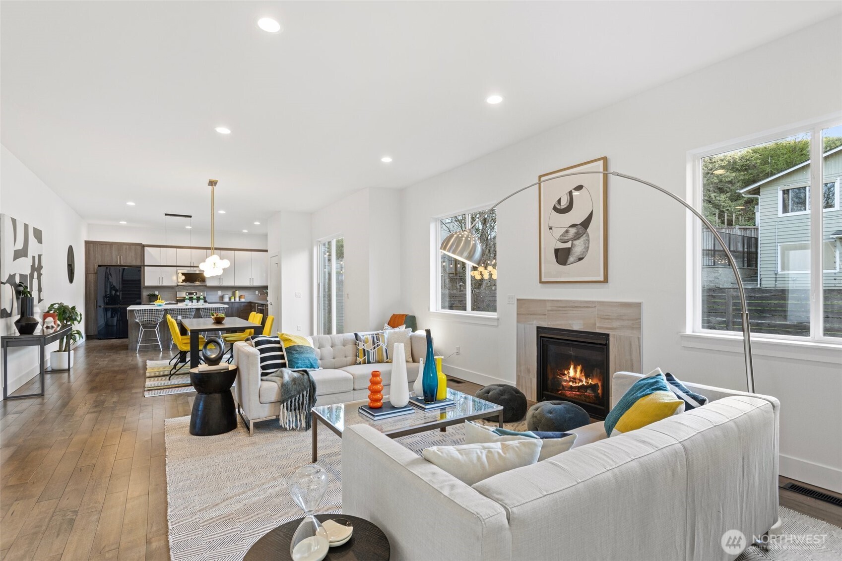 305 Stevens Avenue Southwest Renton, WA 98057 - Photo 8 of 40 a living room with furniture and a fireplace