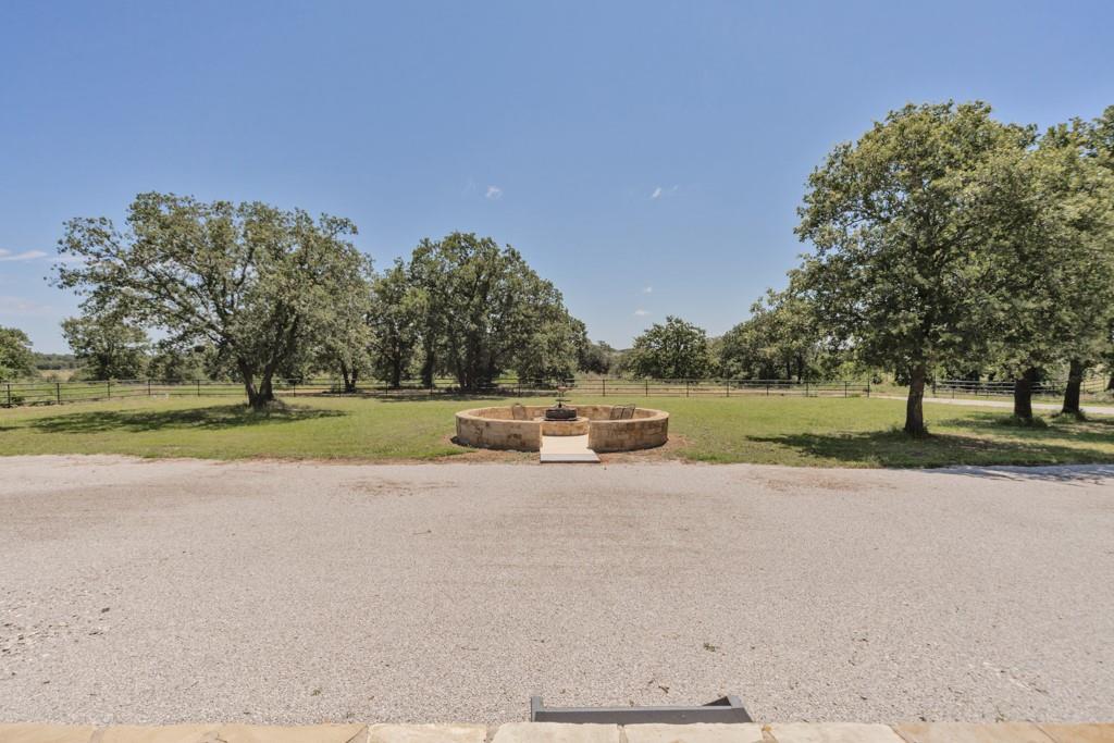 1216 Big Sandy Road Bellevue, TX 76228 - Photo 14 of 36 a view of a lake with a yard