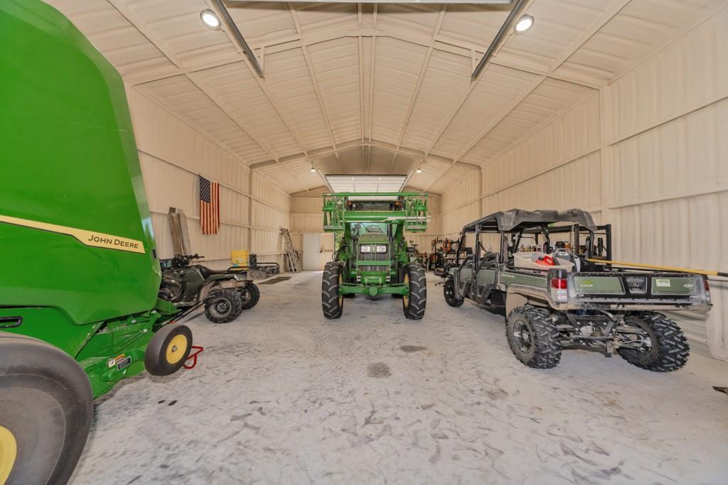 1216 Big Sandy Road Bellevue, TX 76228 - Photo 21 of 36 a view of a room with gym equipment