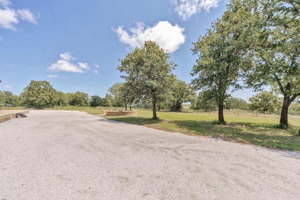 1216 Big Sandy Road Bellevue, TX 76228 - Photo 25 of 36 a view of a house with a big yard