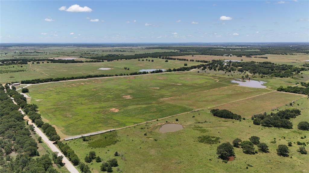 1216 Big Sandy Road Bellevue, TX 76228 - Photo 3 of 36 a view of an ocean and beach