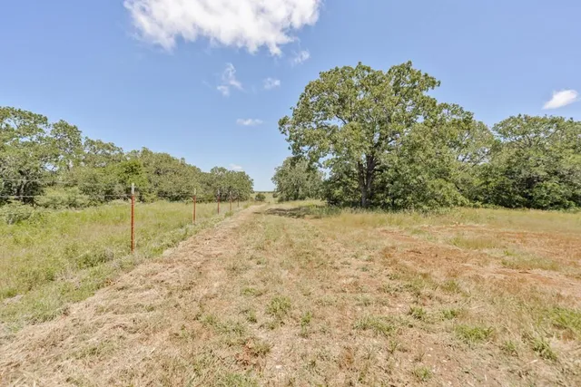 a view of lake with mountain in the background
