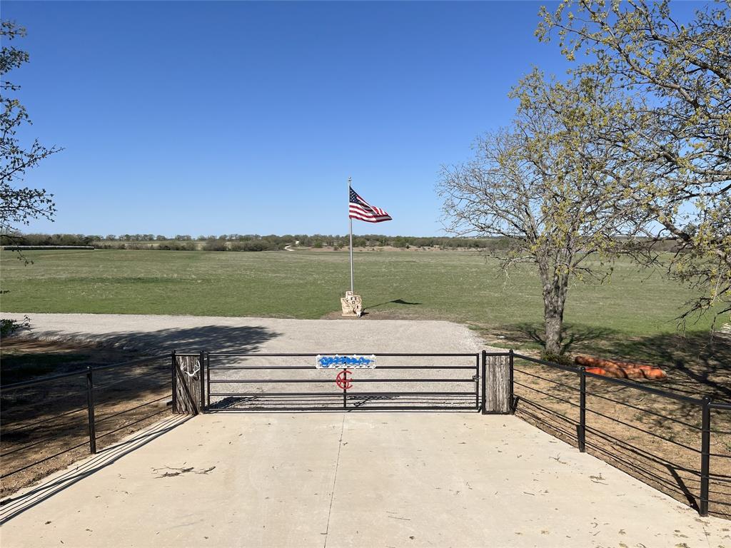 1216 Big Sandy Road Bellevue, TX 76228 - Photo 36 of 36 a view of a terrace with a bench
