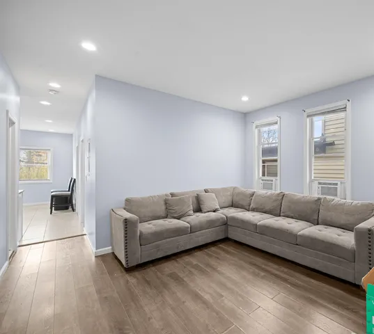 a living room with furniture and a couch
