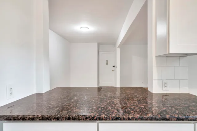 a bathroom with a bathtub toilet and sink
