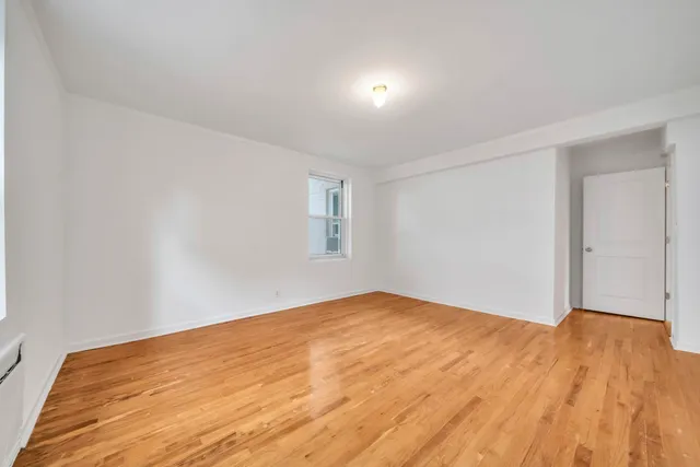 a view of multiple houses with outdoor space